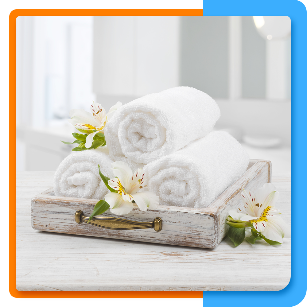 Clean rolled towels and flowers