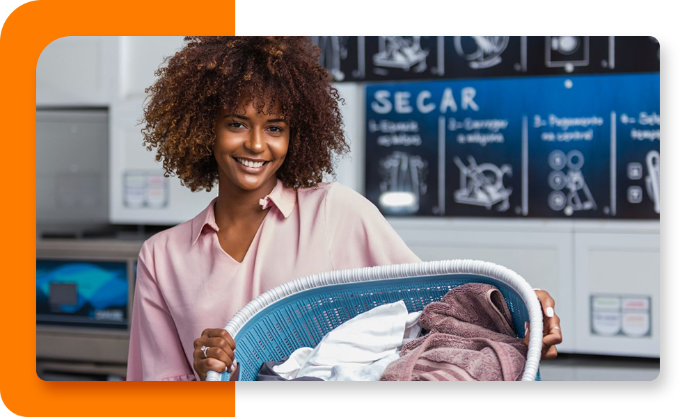 Woman smiling with laundry